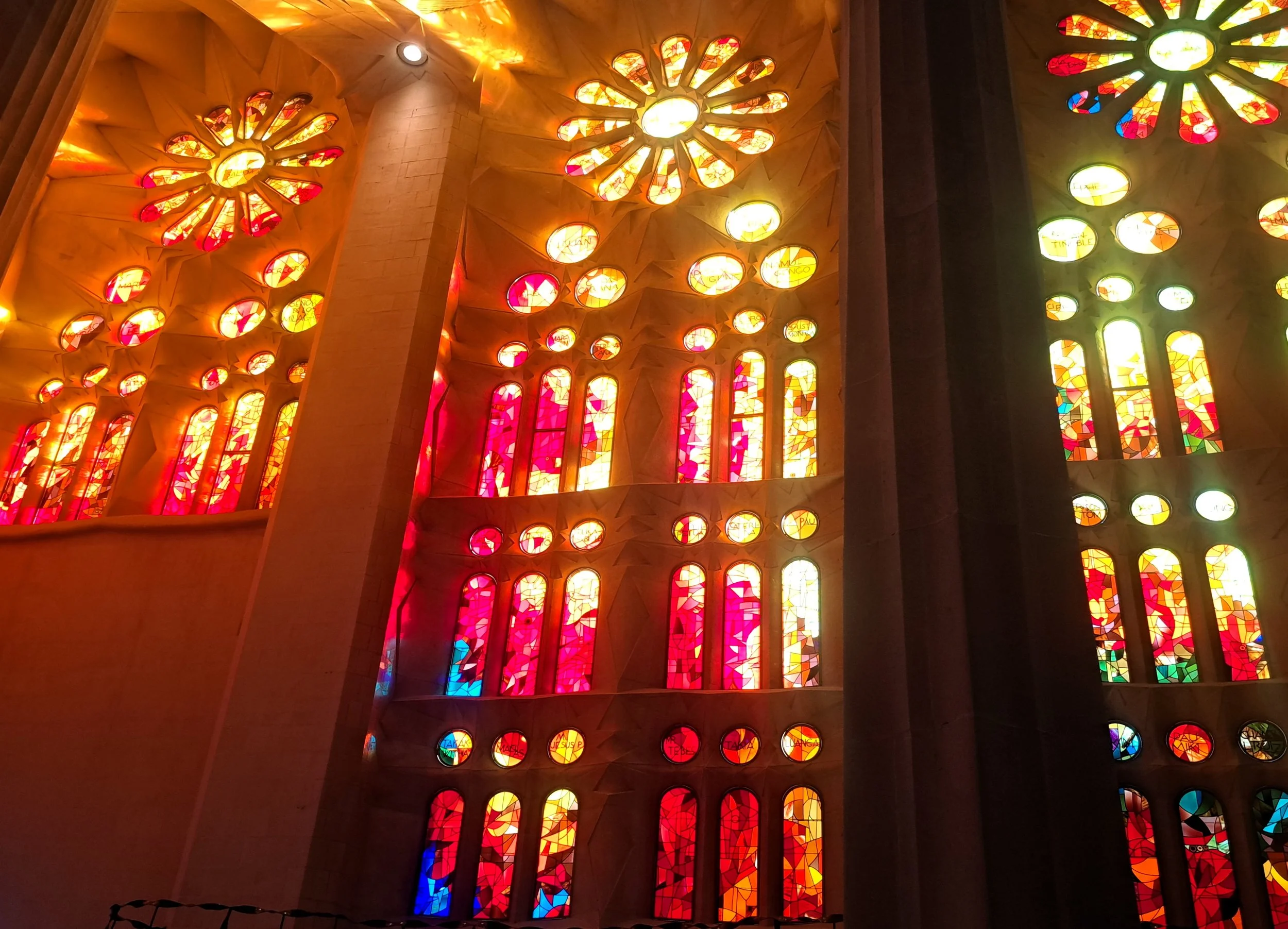 Colorful stained-glass windows inside La Sagrada Familia in Barcelona, Spain
