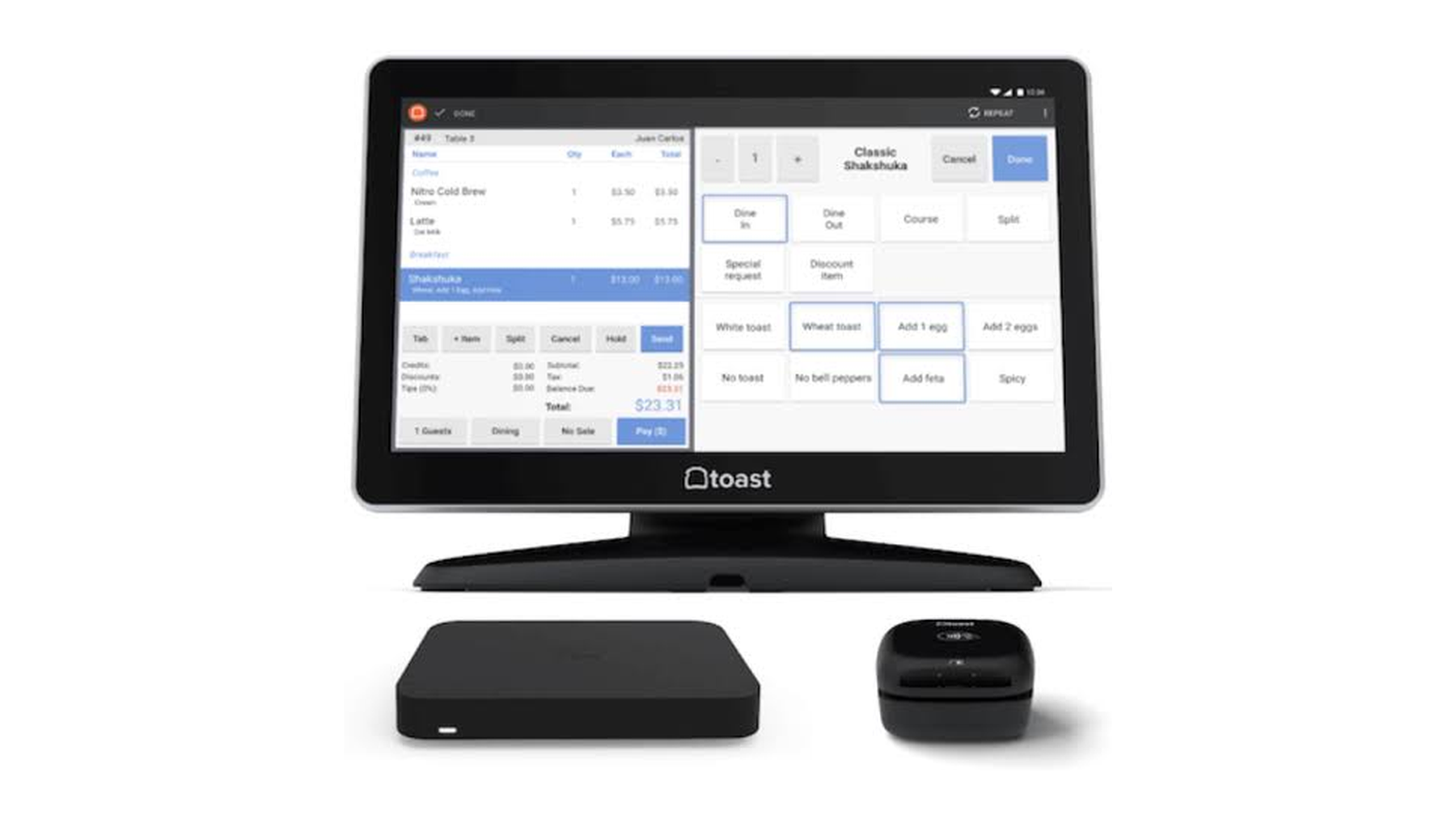 Toast countertop POS terminal showing an order screen, with the Toast hub and router below it.