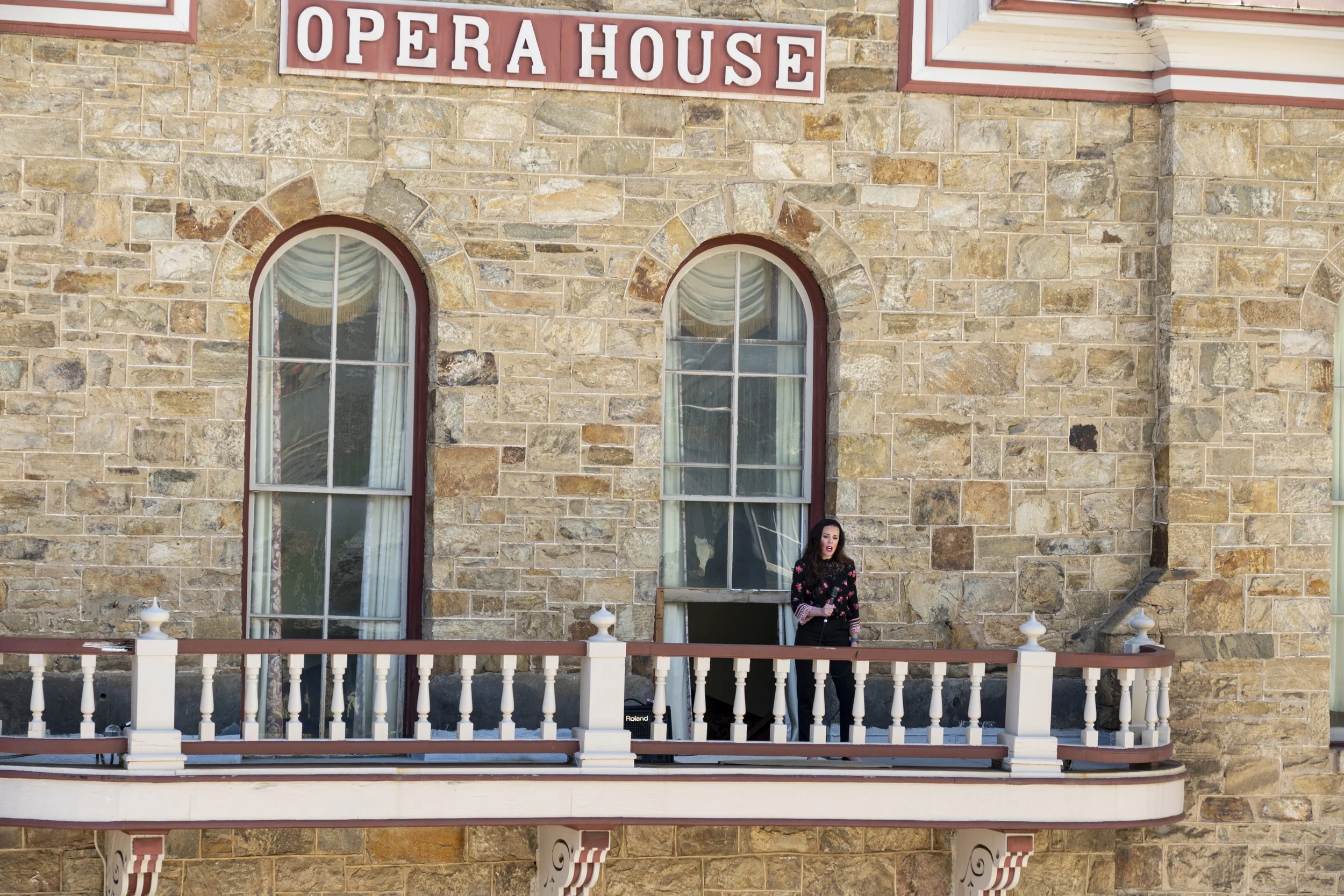 Opera singer on balcony of the Central City Opera House