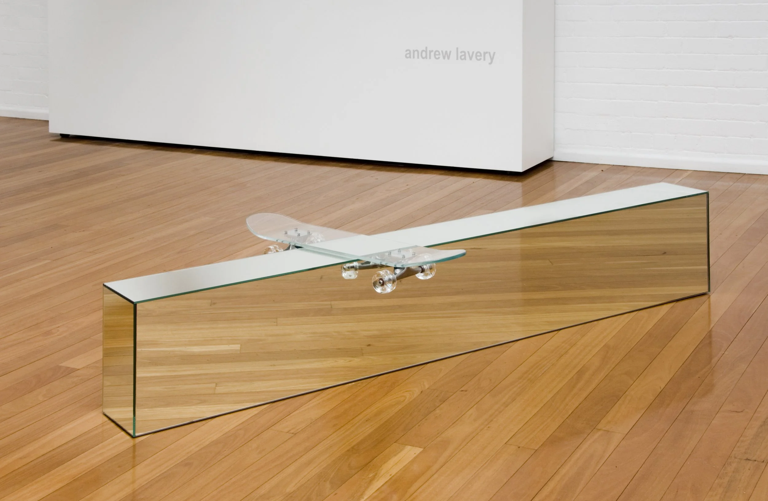 Specular Reflection, 2009, kiln and hot formed glass, skateboard trucks and bearings, mirror, wood, 3020x460x790mm. Photographer: Greg Piper