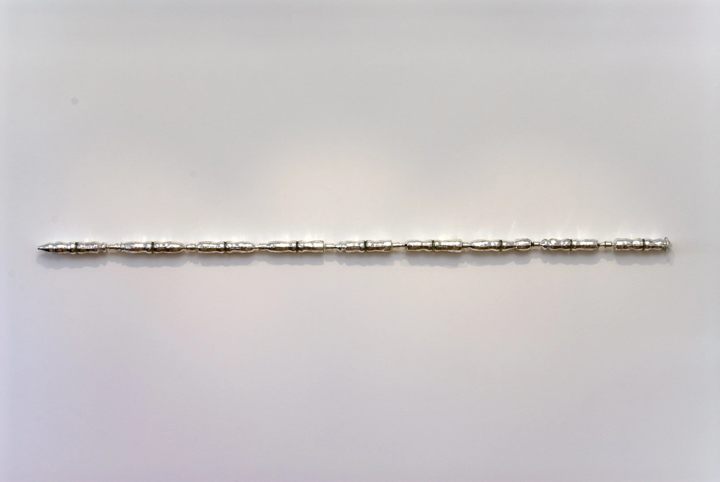 Protracted Perception, 2007, hot formed glass, silver, perspex, 3000x75x75mm.
Photographer: Greg Piper  
