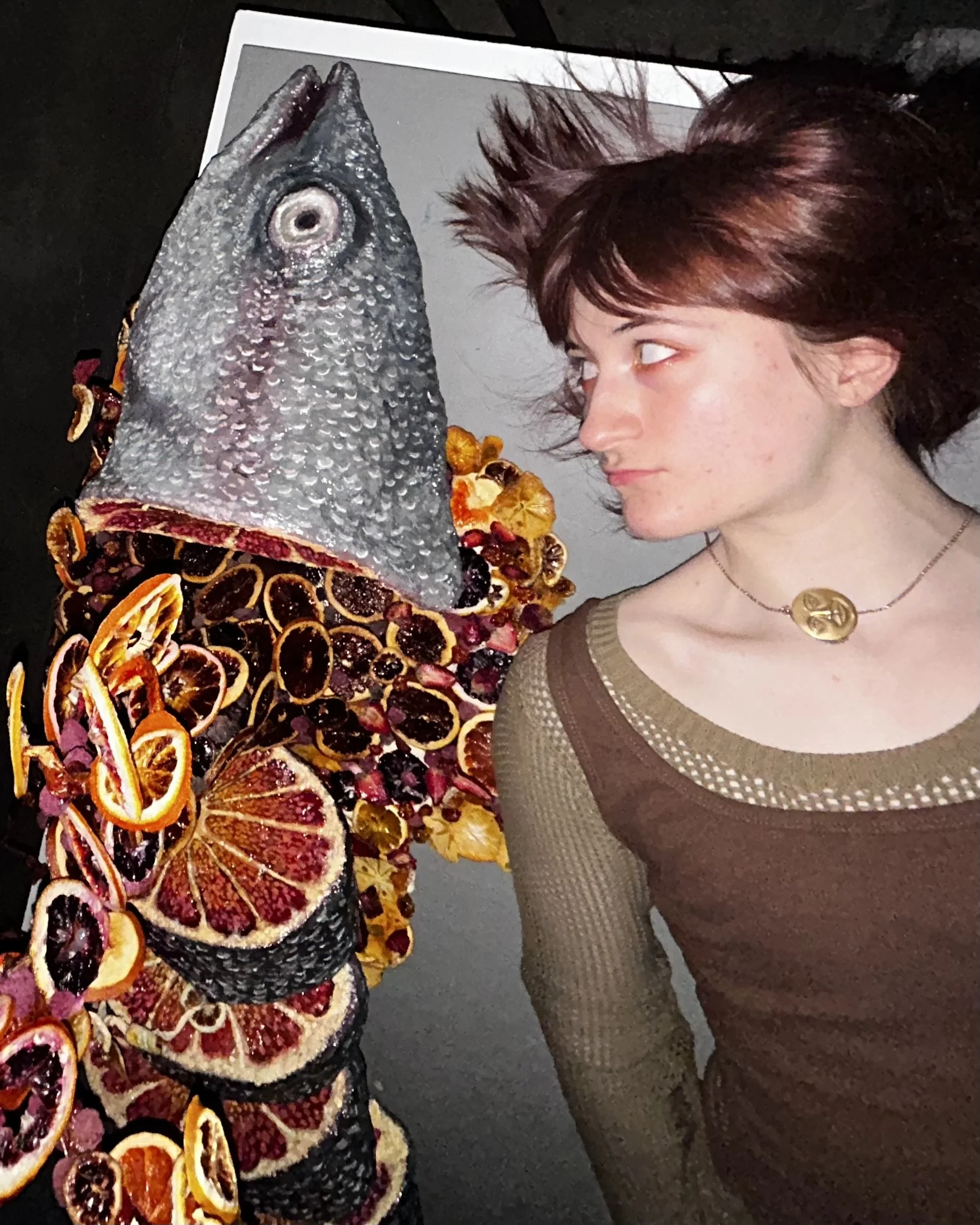Ali Josephine W. with their prize winning sculpture, Stuffed Whole Trout.