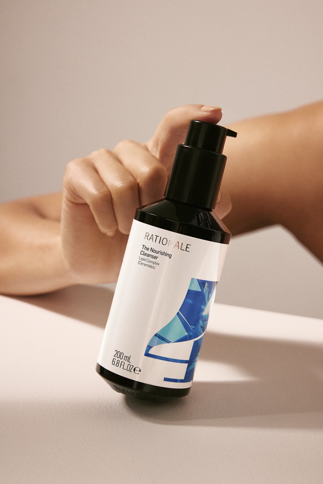 3_RATIONALE-4-NOURISHING-CLEANSER-200ML_IN-HAND.jpg