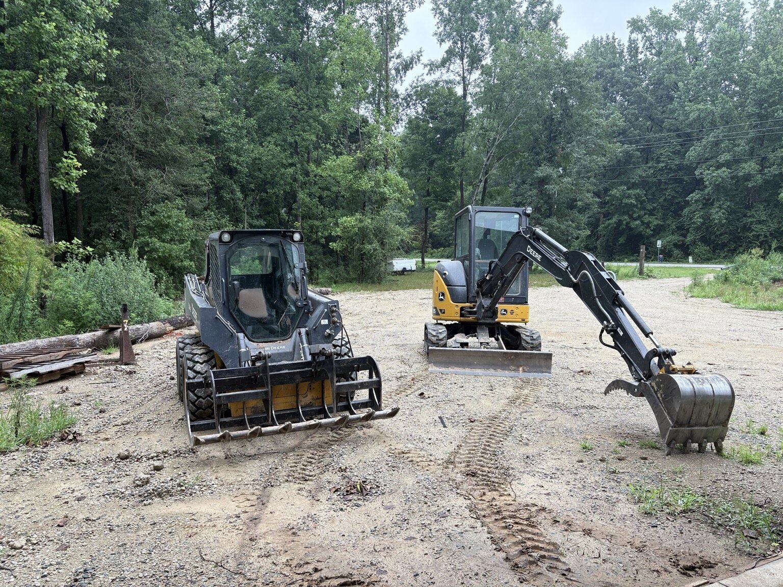 KMF Site Work John Deere excavator and skid steer for land clearing and grading