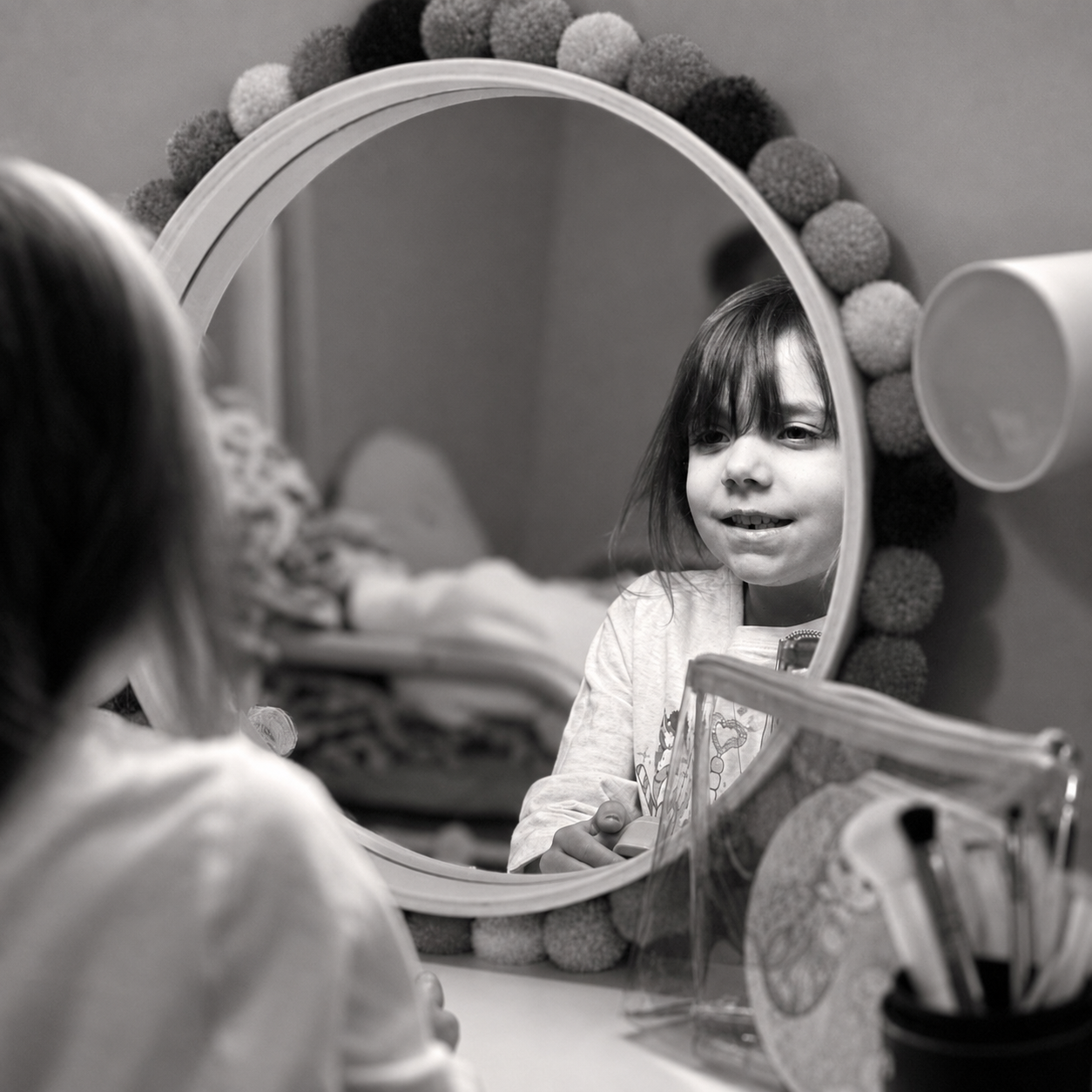 Angie's granddaughter looking at herself in the mirror — where the story lands