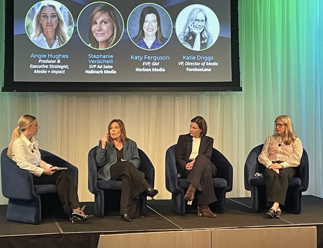 Angie Hughes moderating a Women in Media executive panel with leaders from Hallmark Media, Horizon Media, and Ferebee Lane