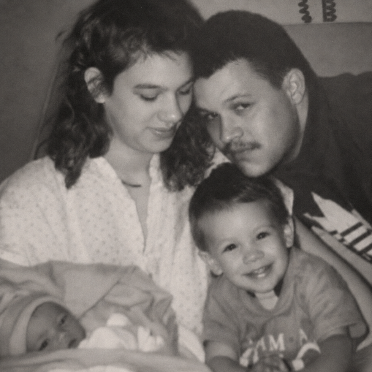 Angie Hughes as a teenager with her young family — the beginning of the story