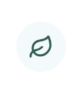 A white circle with a green leaf icon in the center