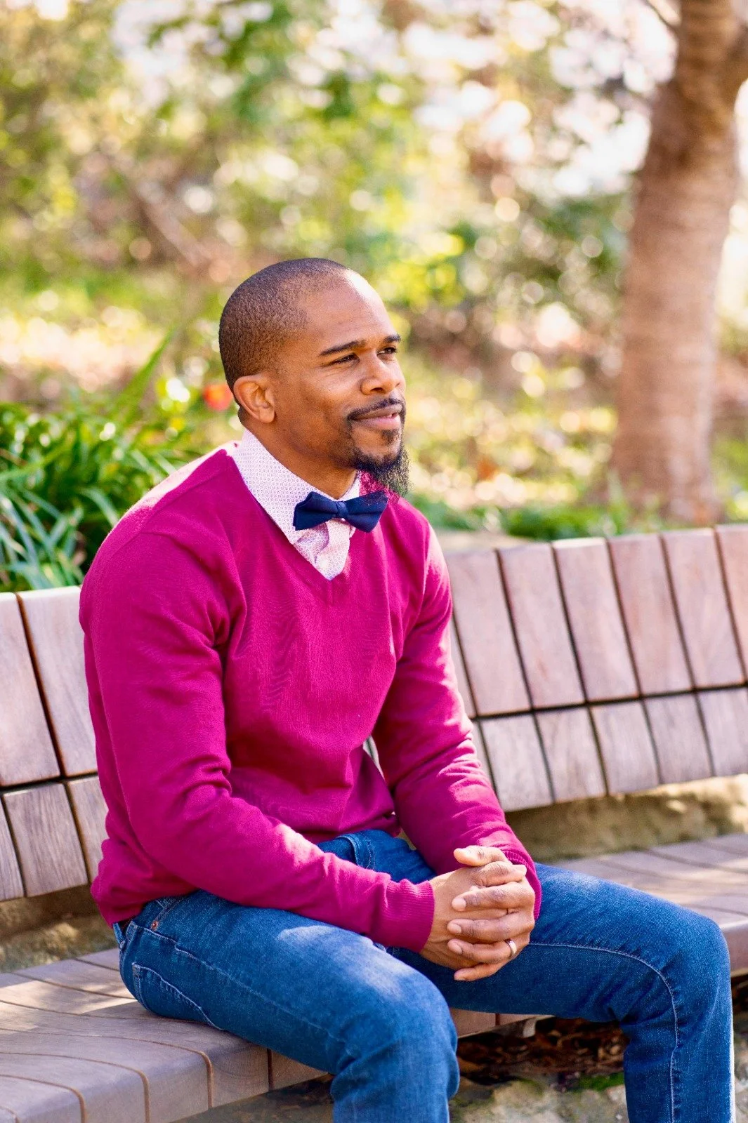 Lee Consulting Group professional counselor sitting outdoors, representing mental health support and wellness services in North Carolina.