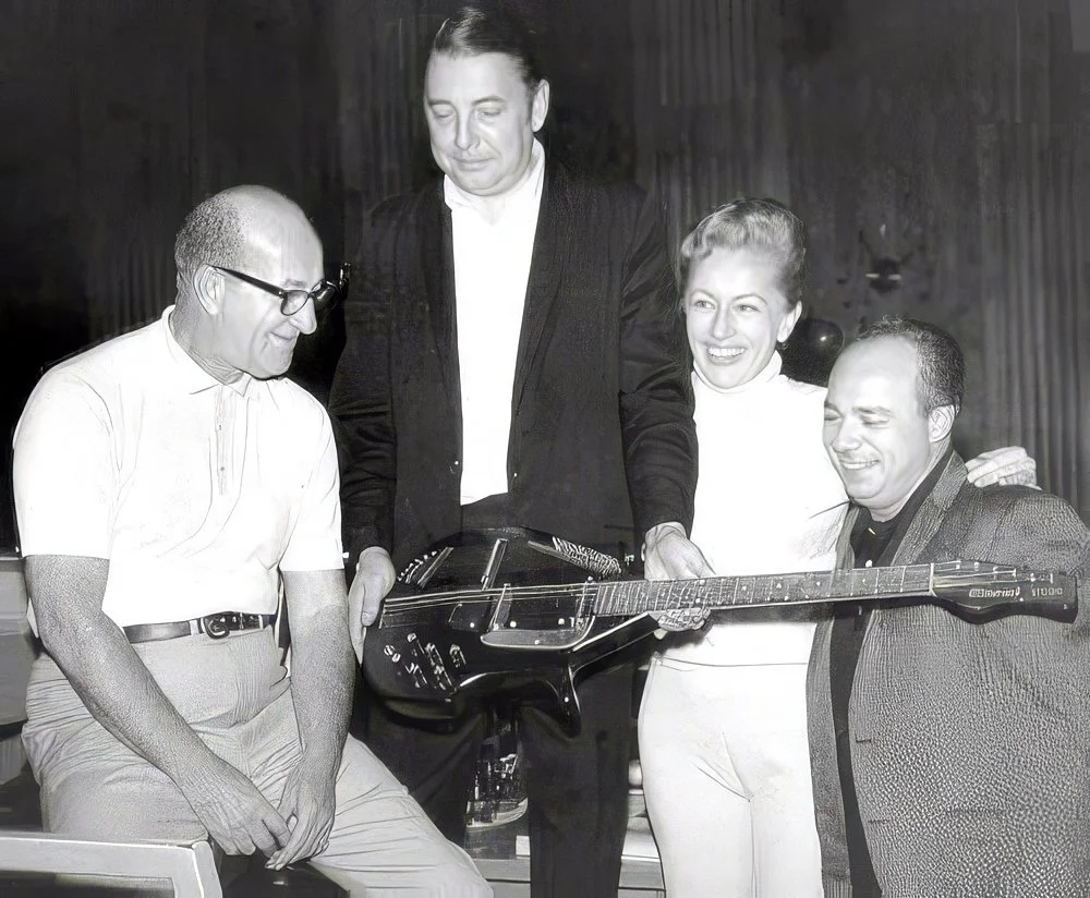 Carol & Friends
Left to right - Joseph Gershenson, Bob Bain,
Carol Kaye, and Don Costa with Vinnie Bell's invention, the Electric Sitar.