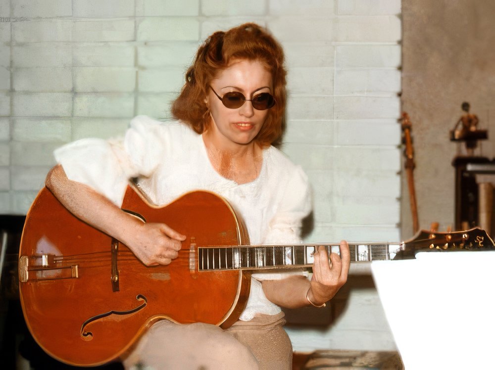 Carol and her CK and her Emperor Epiphone Guitar 1971
Carol's Emperor was Phil Spector's favorite.
Photo by Greg Schneider