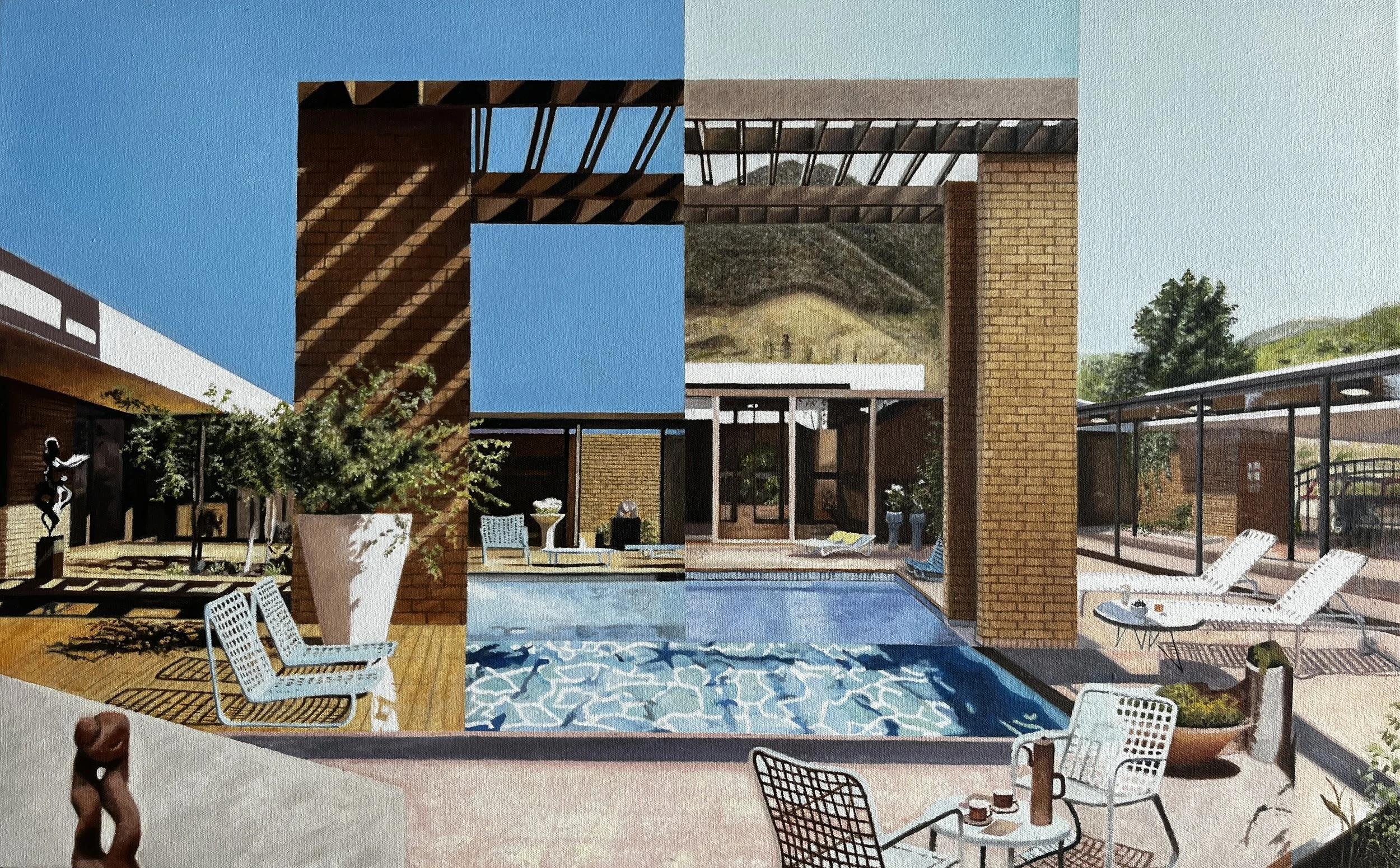 Outdoor patio area with pool, lounge chairs, and surrounding brick and glass structures. There are trees and hills in the background.