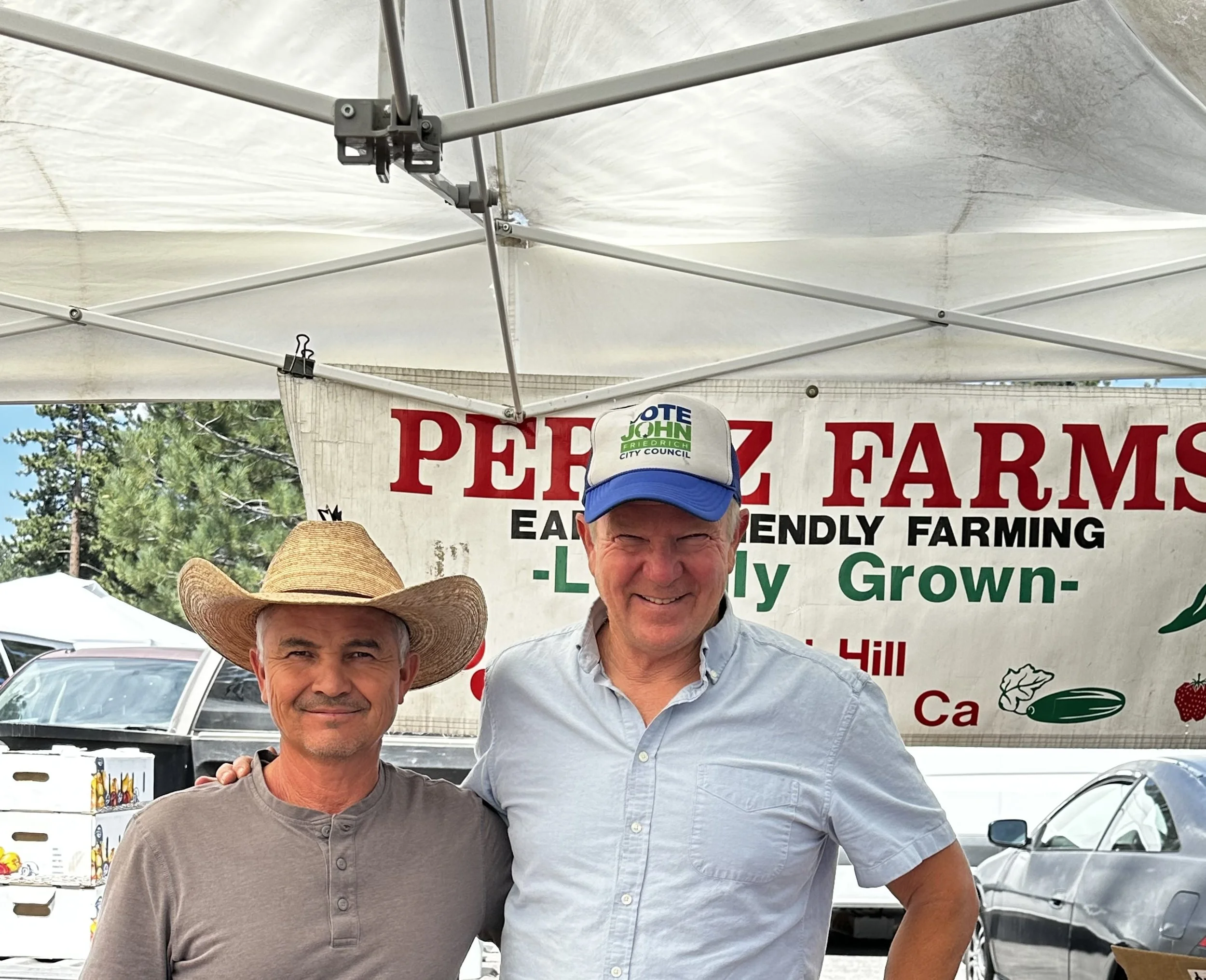 Catching up with farmer Gerardo Lopez at the Tuesday market at American Legion