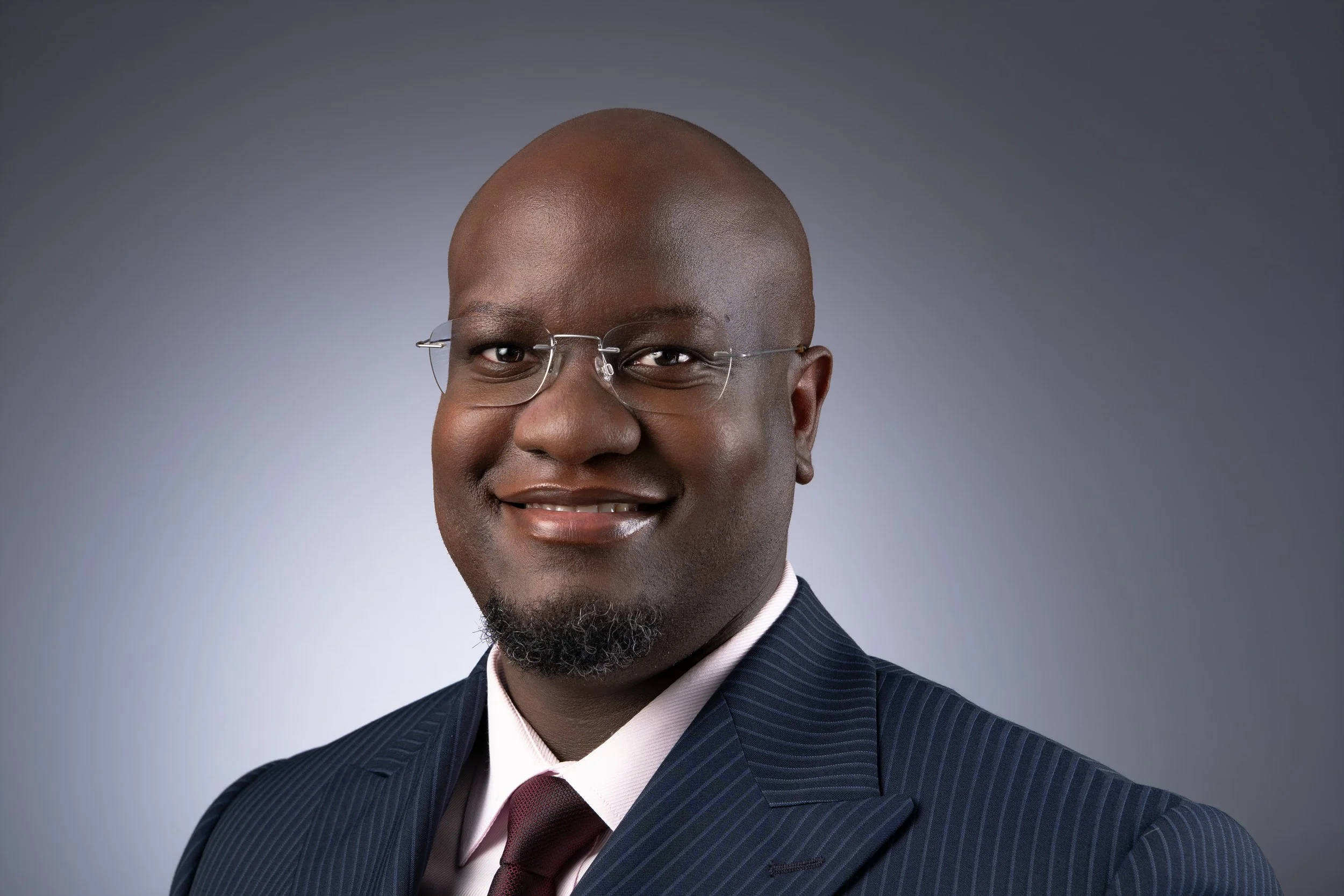 Ivan Ninsiima Headshot 2.jpg