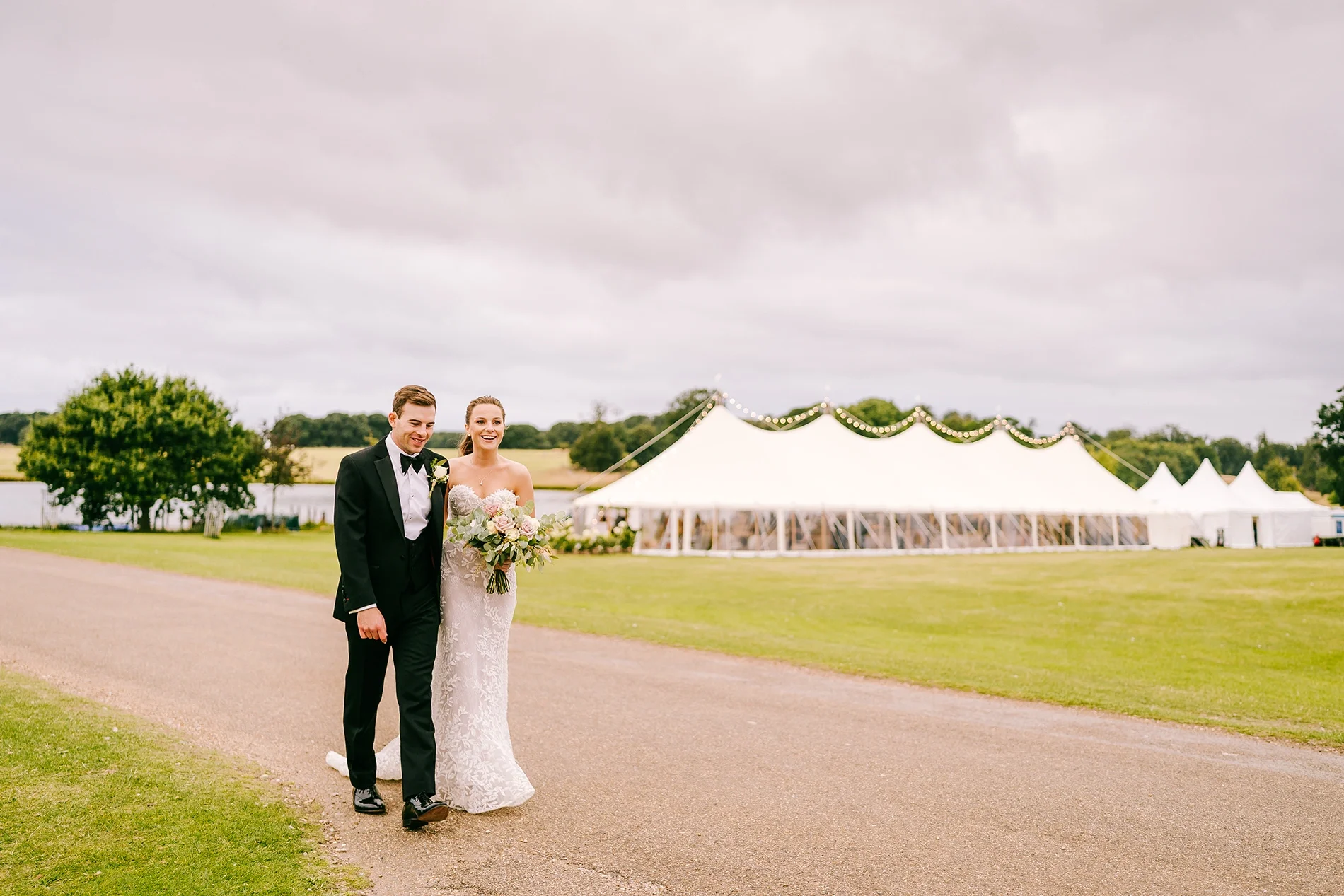 A newlywed couple on their wedding day at Holkham Hall