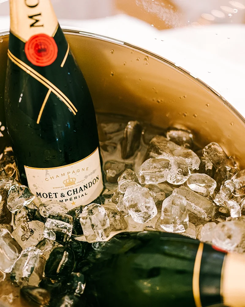Bottles of Moet and Chandon champagne on ice