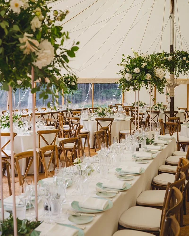 A traditional wedding marquee with floral decor