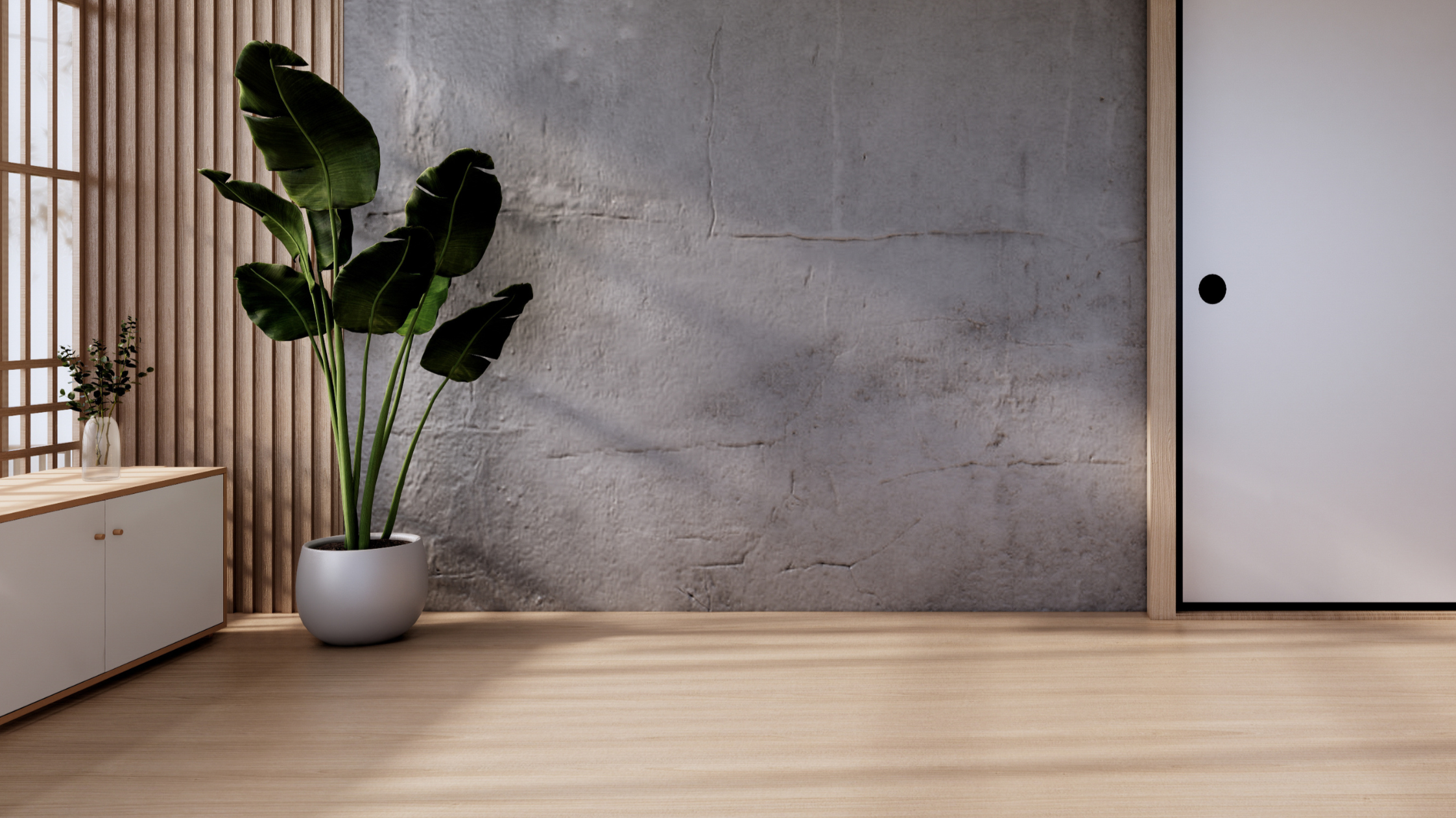 Interior space with a large green plant in a white pot, white cabinet, and a background featuring a textured concrete wall and wooden lattice panel.