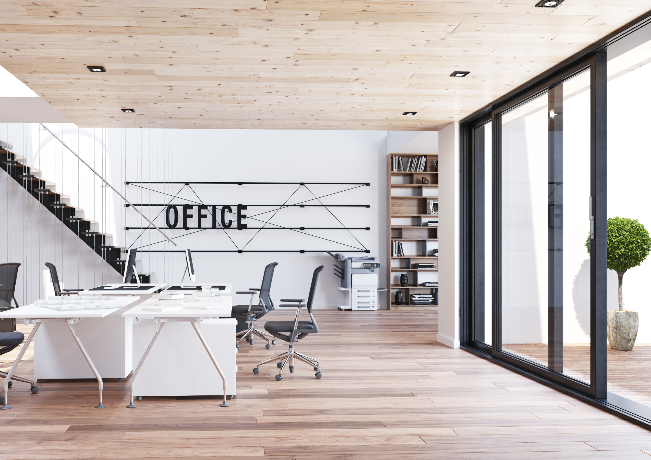 Modern office space with white desks, black chairs, wooden floors, large glass sliding doors, bookshelf with books, and a sign that reads 'OFFICE' on the wall.