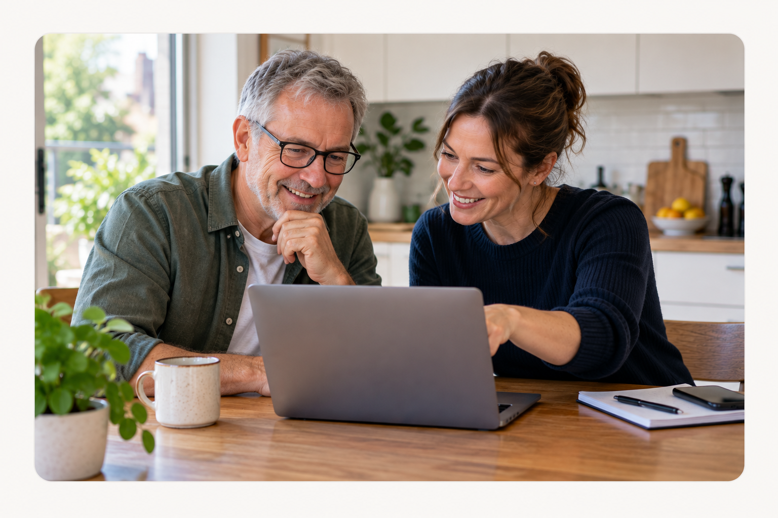 Melbourne adult getting help with a laptop at home.