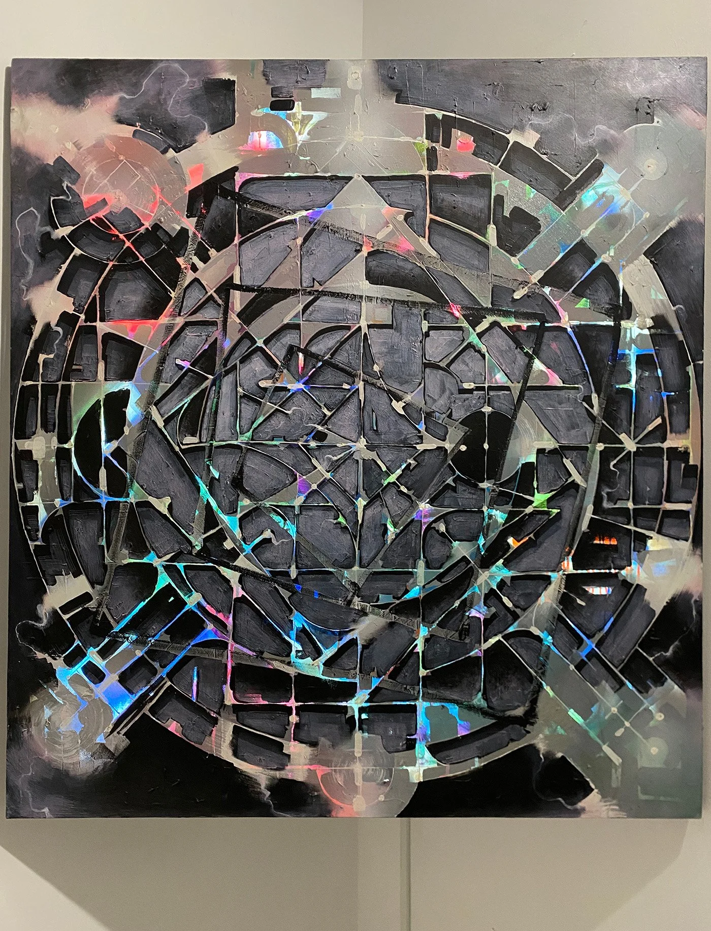 dark psychedelic abstract geometric mandala painting with colorful reflective bits throughout