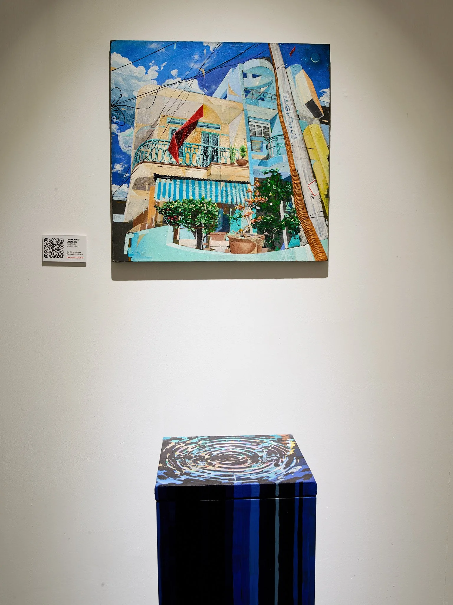 painting of house with another painting of its reflection in water in front