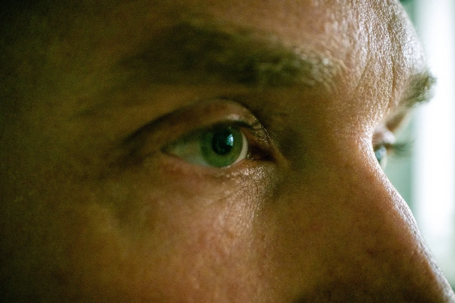 close up of eyes looking intently to the side