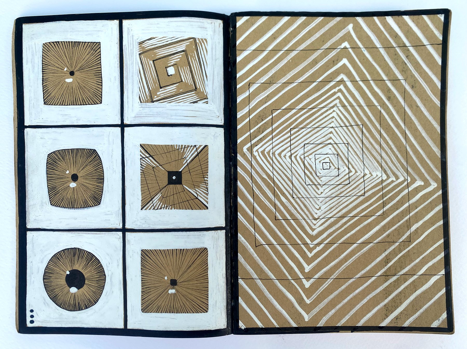 Open art book displaying geometric pattern drawings on both pages. The left page features grid of six abstract designs with planet-like circles and intricate lines, primarily in black, white, and brown. The right page showcases a spiral pattern of br