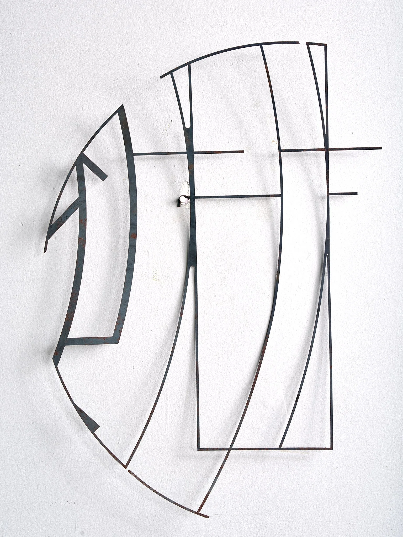 abstract geometric metal sculpture like a thin line drawing on a white wall