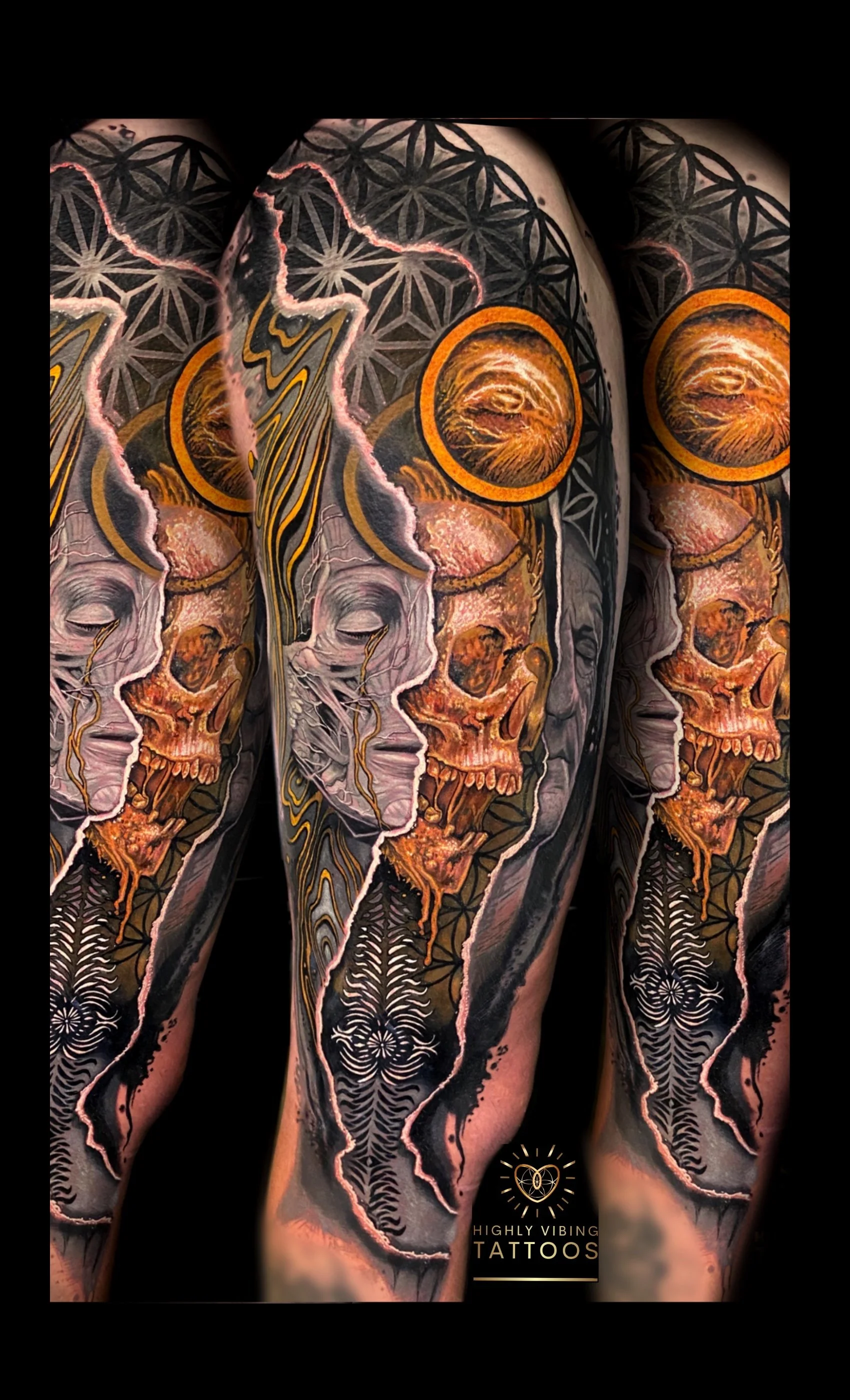 Close-up of a person's arm with detailed black tattoo sleeves featuring skulls, faces, geometric patterns, and vibrant orange and gold accents, advertising highly vibing tattoos. Daniel Armitage, Calgary Alberta, Surrealist Tattoo Artist, YYC