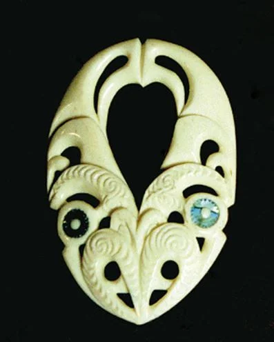 Bone carving representing ika, the fish