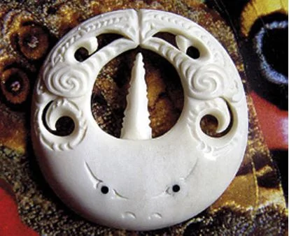 Stingray carving with manaia faces on its wings