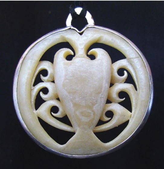 Koura carving strengthened with silver