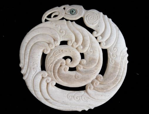 Whalebone carving by Owen Mapp representing Ngāke emerging from the ocean