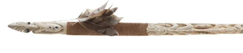A tokotoko kórero over 1400 millimetres long representing the story of the waka Huruhuru Manu. The tradition of these ‘talking sticks’ is that whoever holds it has the floor, and can talk without interruption.