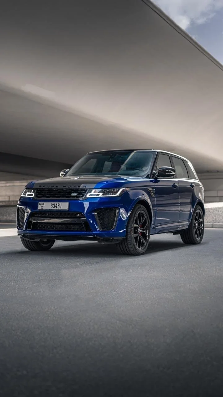 Blue Range Rover Sport SVR available for rental in Dubai – front three-quarter view