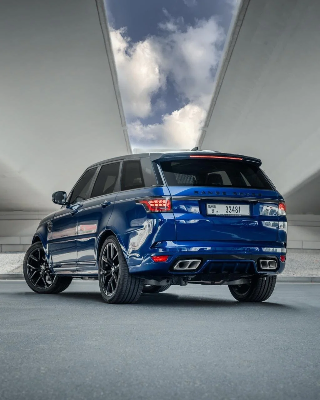 Blue Range Rover Sport SVR for rent in Dubai – rear three-quarter exterior view