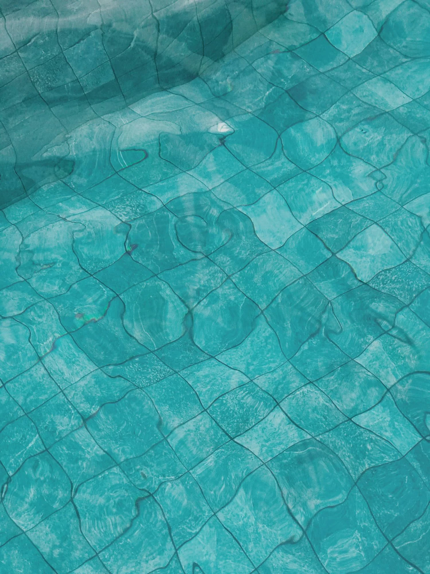 swimming-pool-with-ripples-over-water.jpg