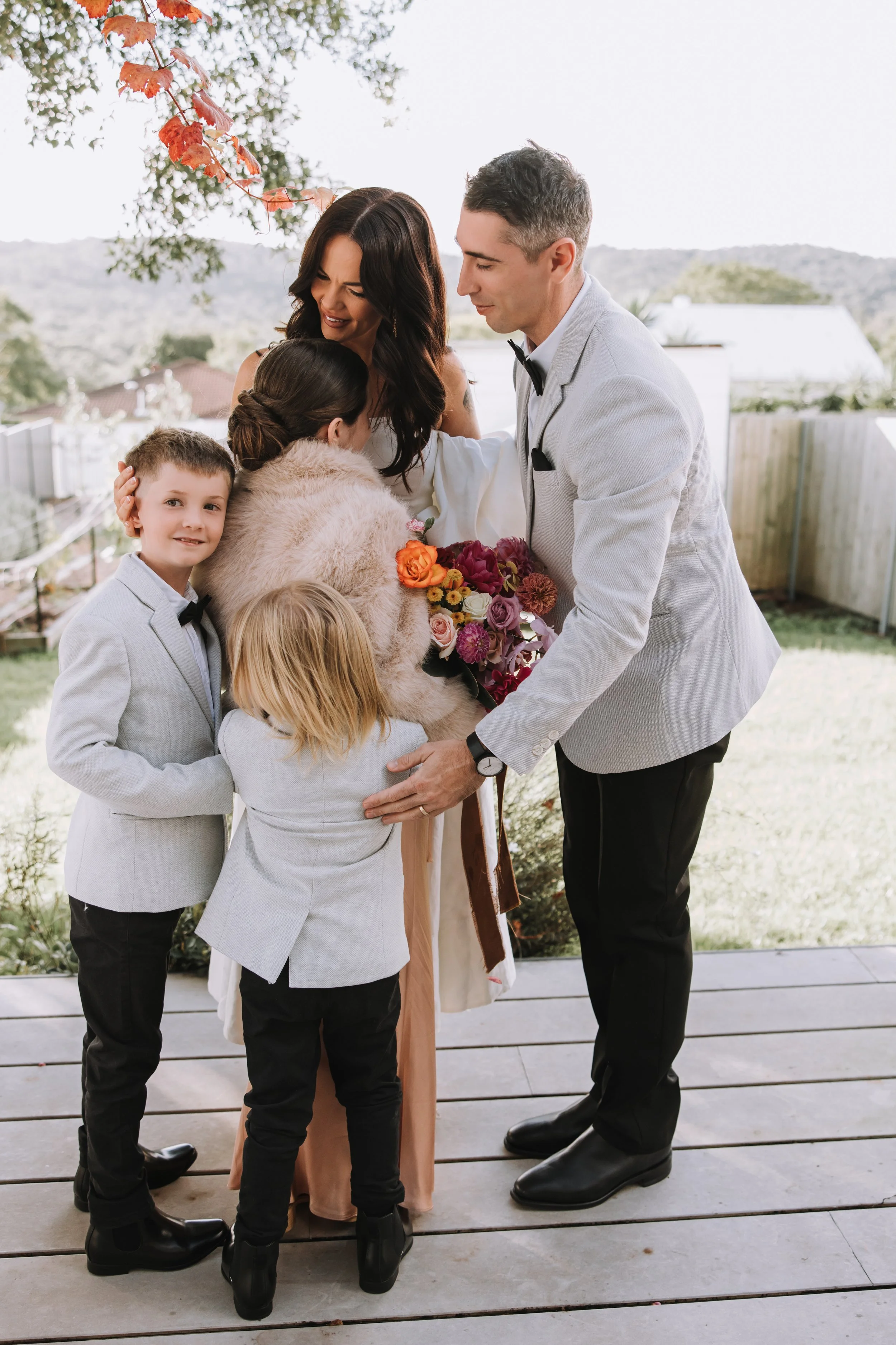 An eloping couple with their family - captured by Nicole Butler from Words and Light