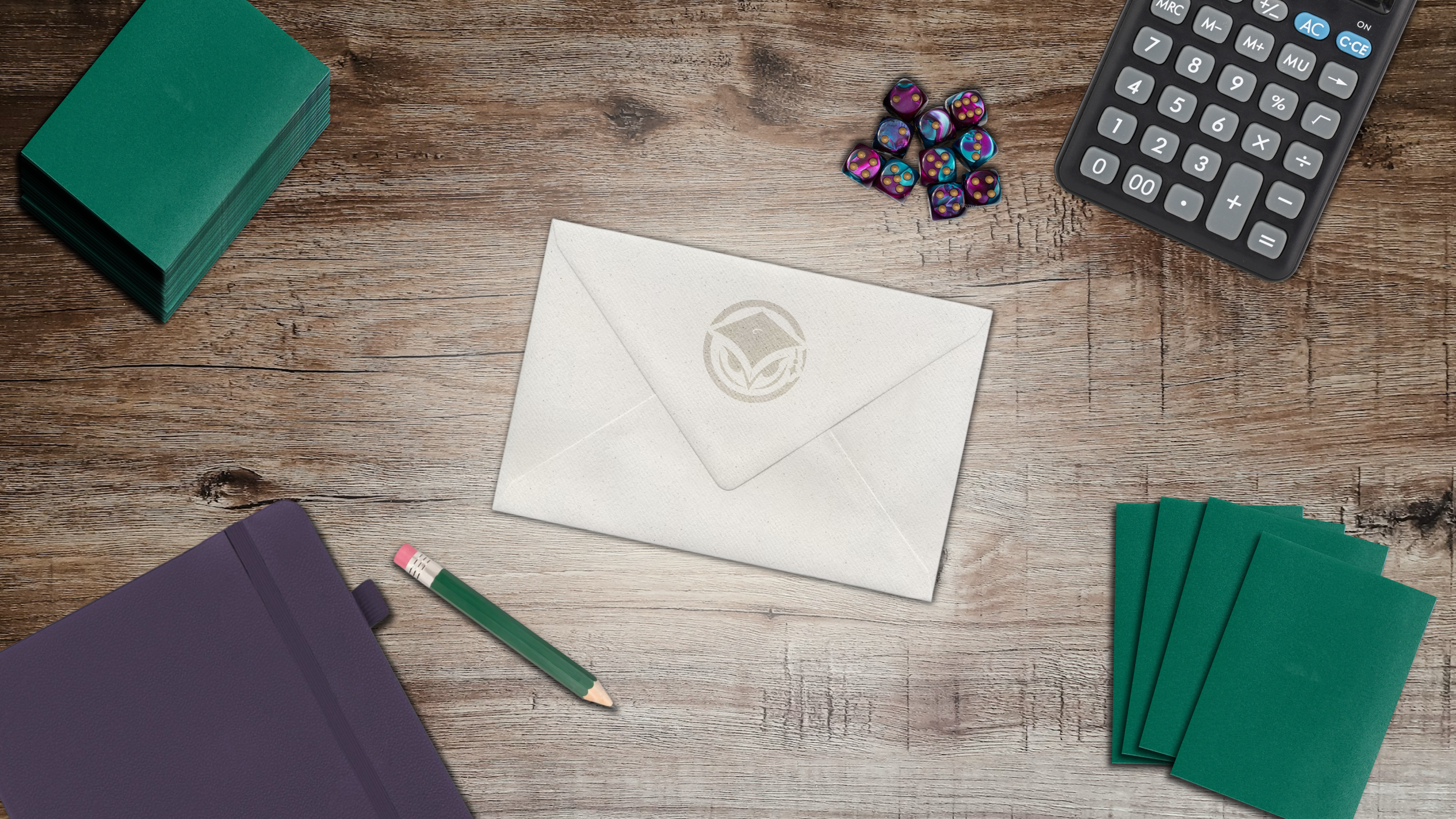 Desk with stacks of green trading cards, a white envelope with a logo, a green pencil, a calculator, purple dice, purple notebook, and other stationery items.