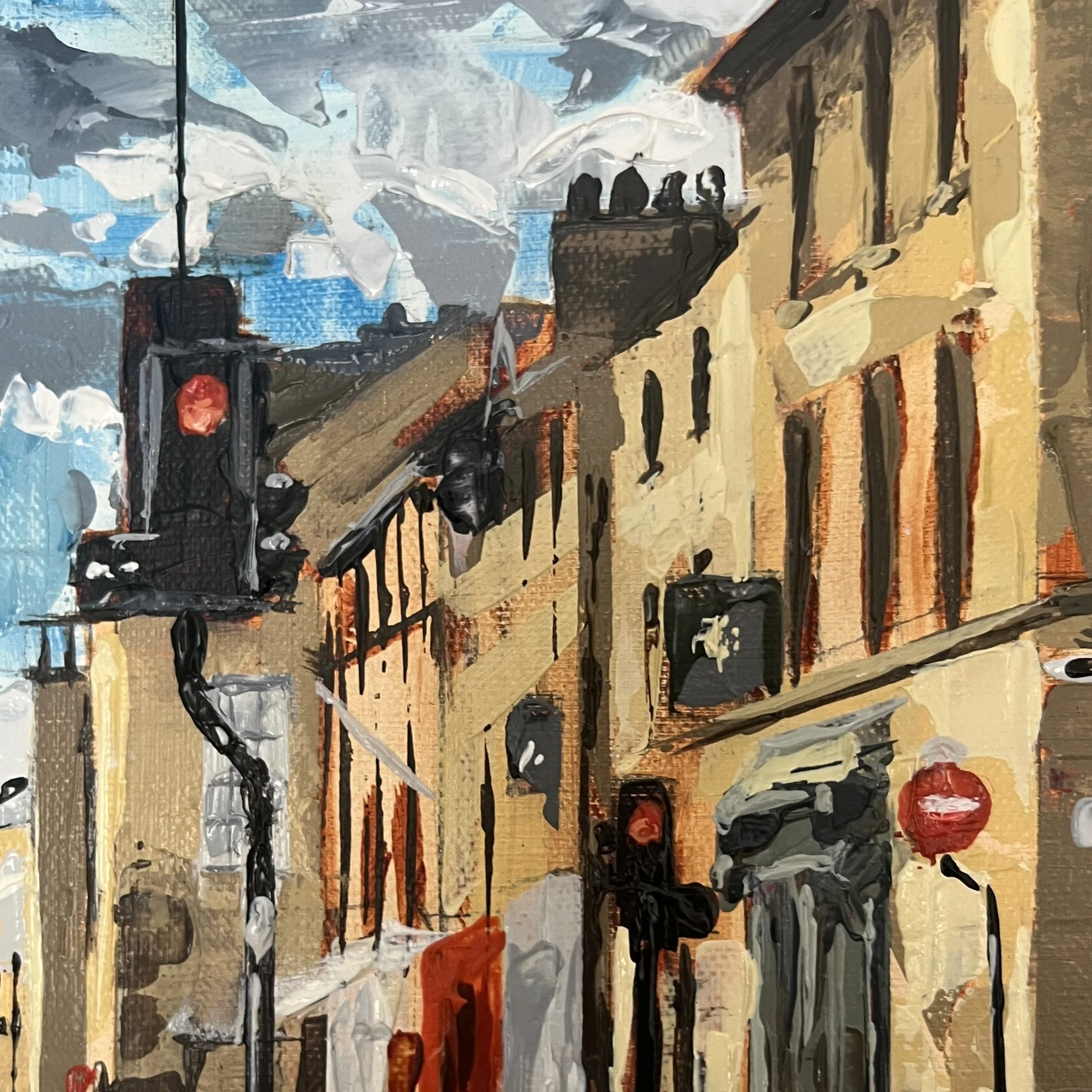 Traffic lights on red and the warmth of Lancaster stone down Brock Street are captured in this close up oil painting detail.