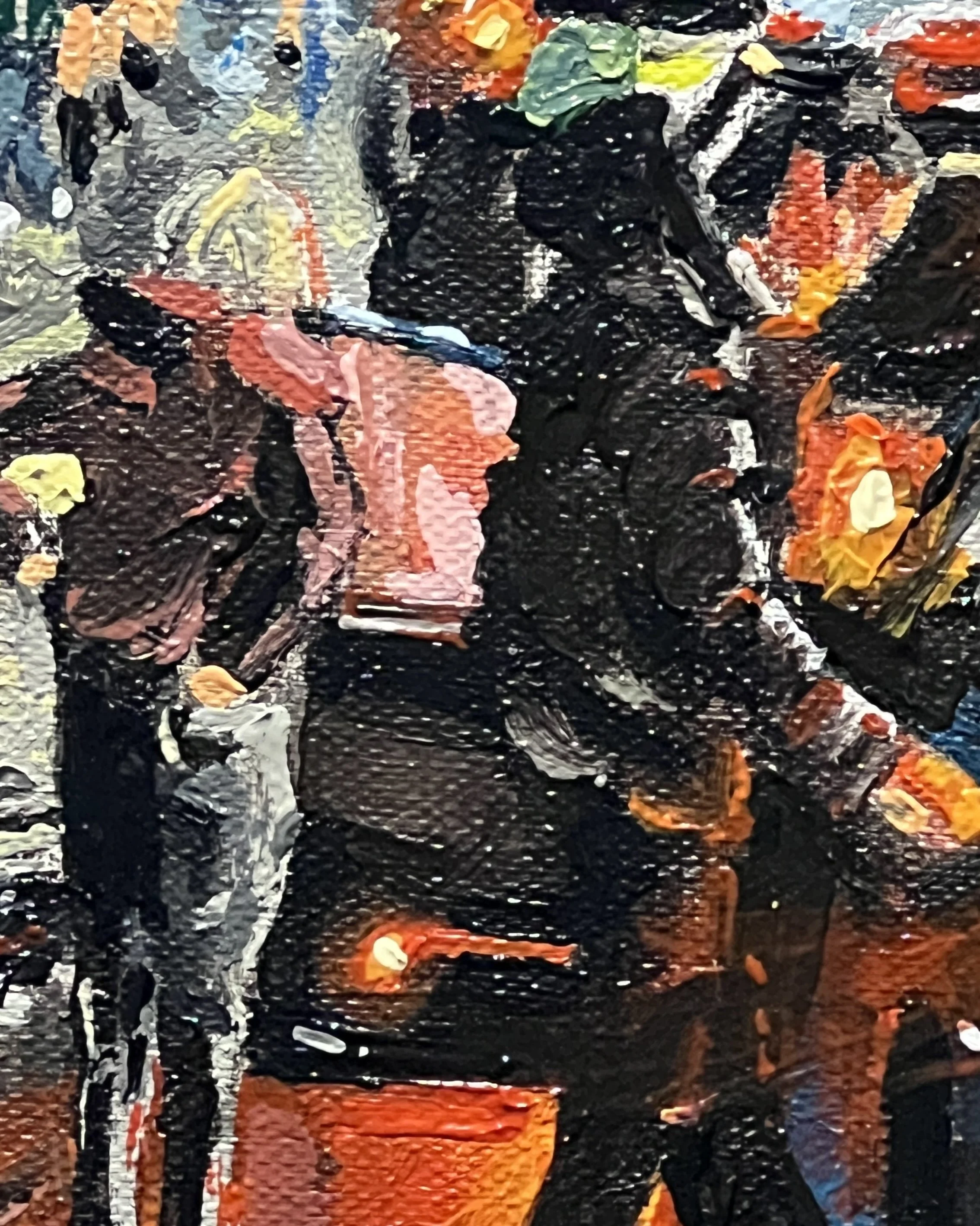 Close up detail showing a man wearing a puffer jacket getting into a taxi. A woman stands with hands on hips watching people on Lower Church Street, Lancaster. 
