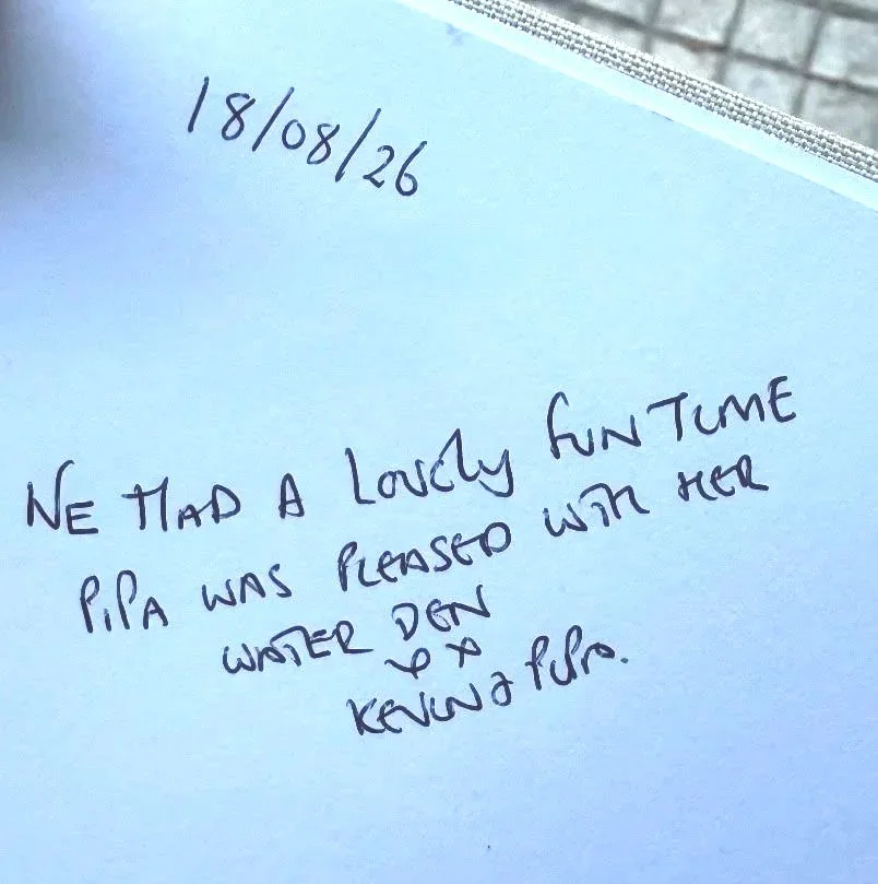 A handwritten note on a blue paper with the date 18/08/26 at the top. The note reads: 'We had a lovely fun time Pipa was pleased with her water pen & knowing it.'