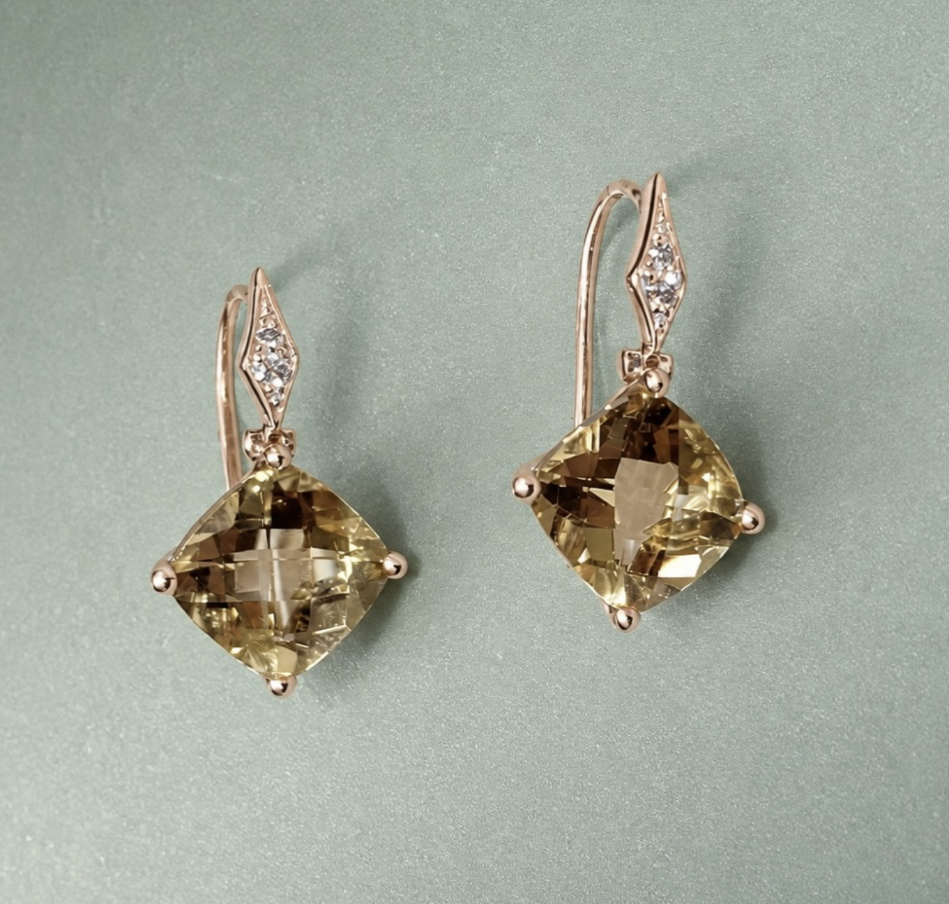 A pair of 18K rose gold diamond orange crystal earrings (4D)