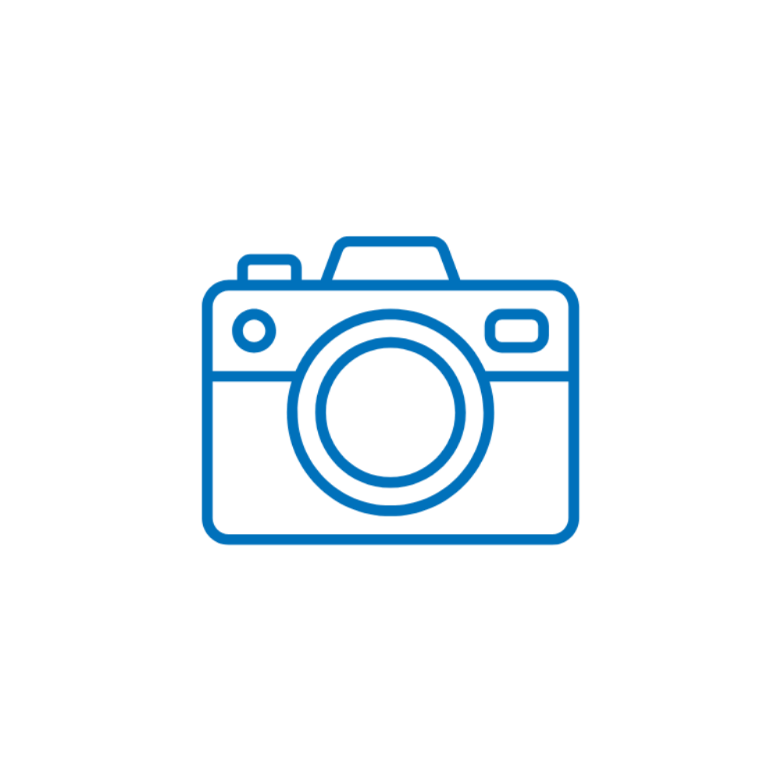 Blue line drawing of a camera on a black background.