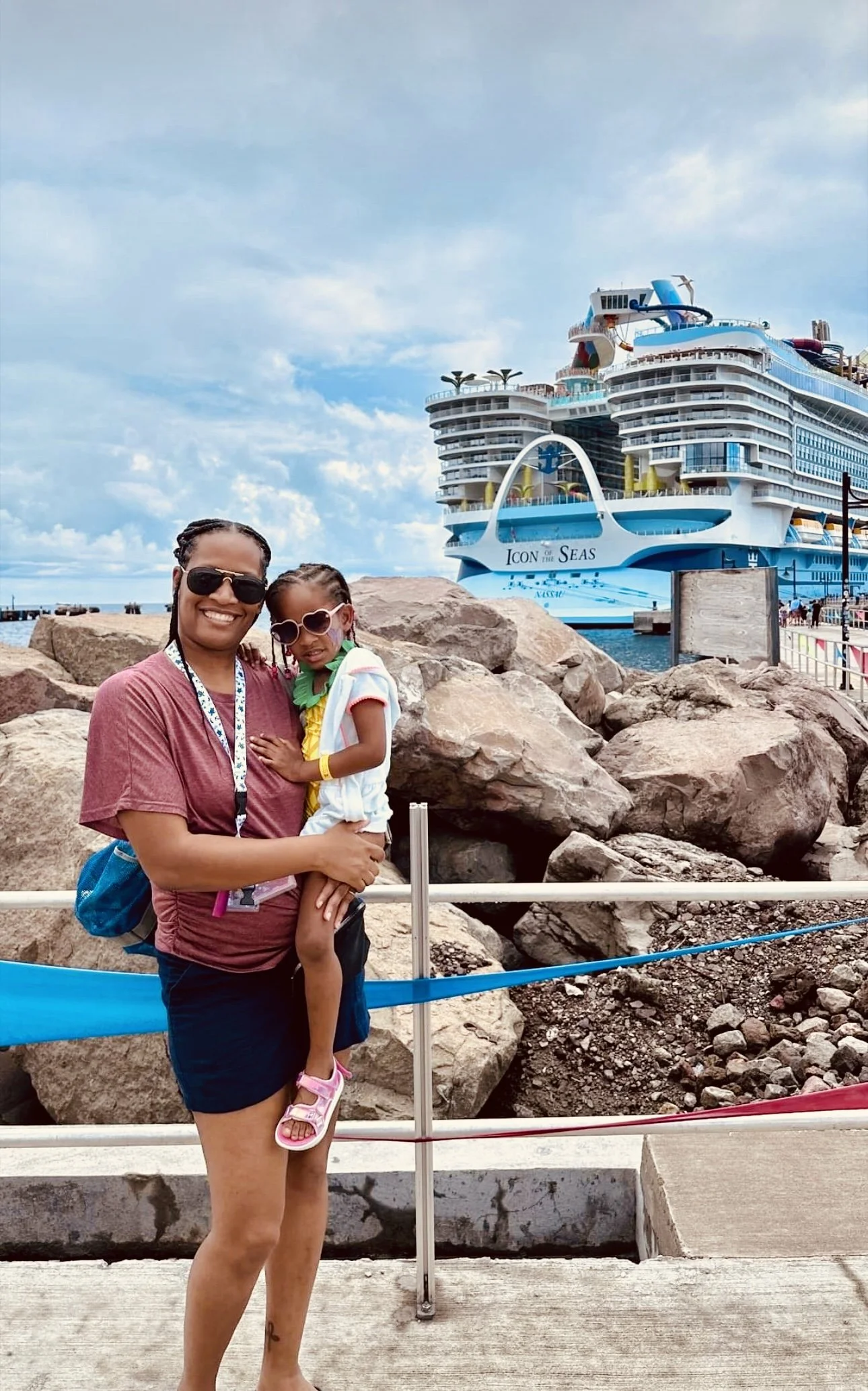 Mother and daughter smiling together aboard Royal Caribbean’s Icon of the Seas cruise, enjoying a memorable family vacation at sea.