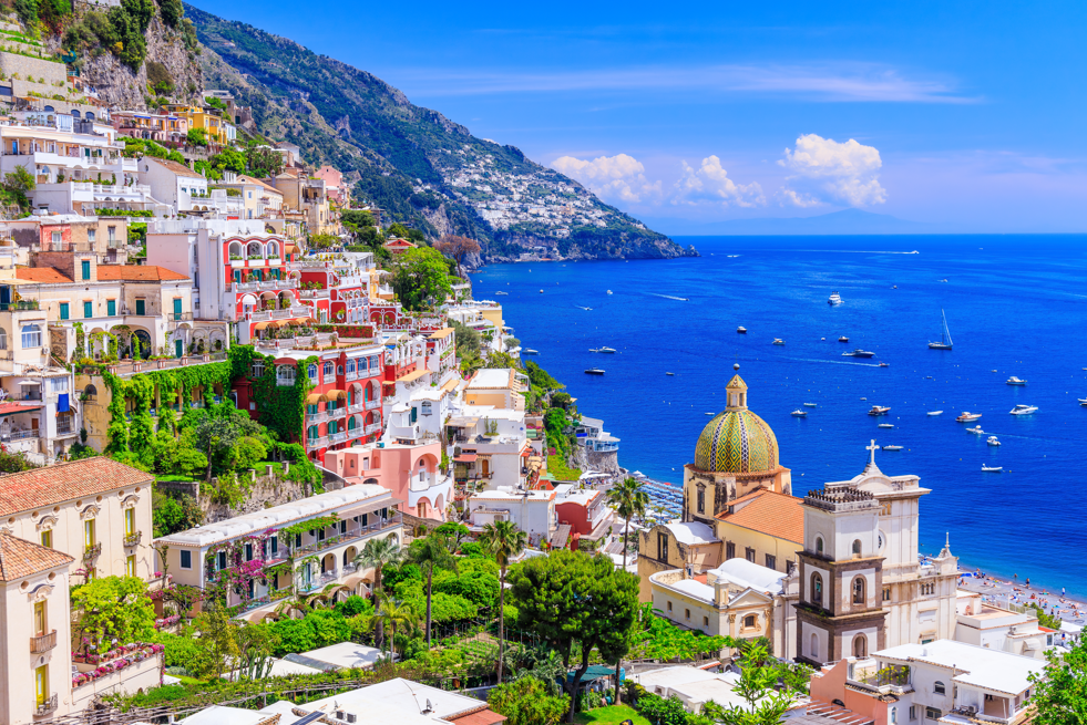 Amalfi Coast, Italy, with colorful cliffside villages overlooking the Mediterranean Sea.