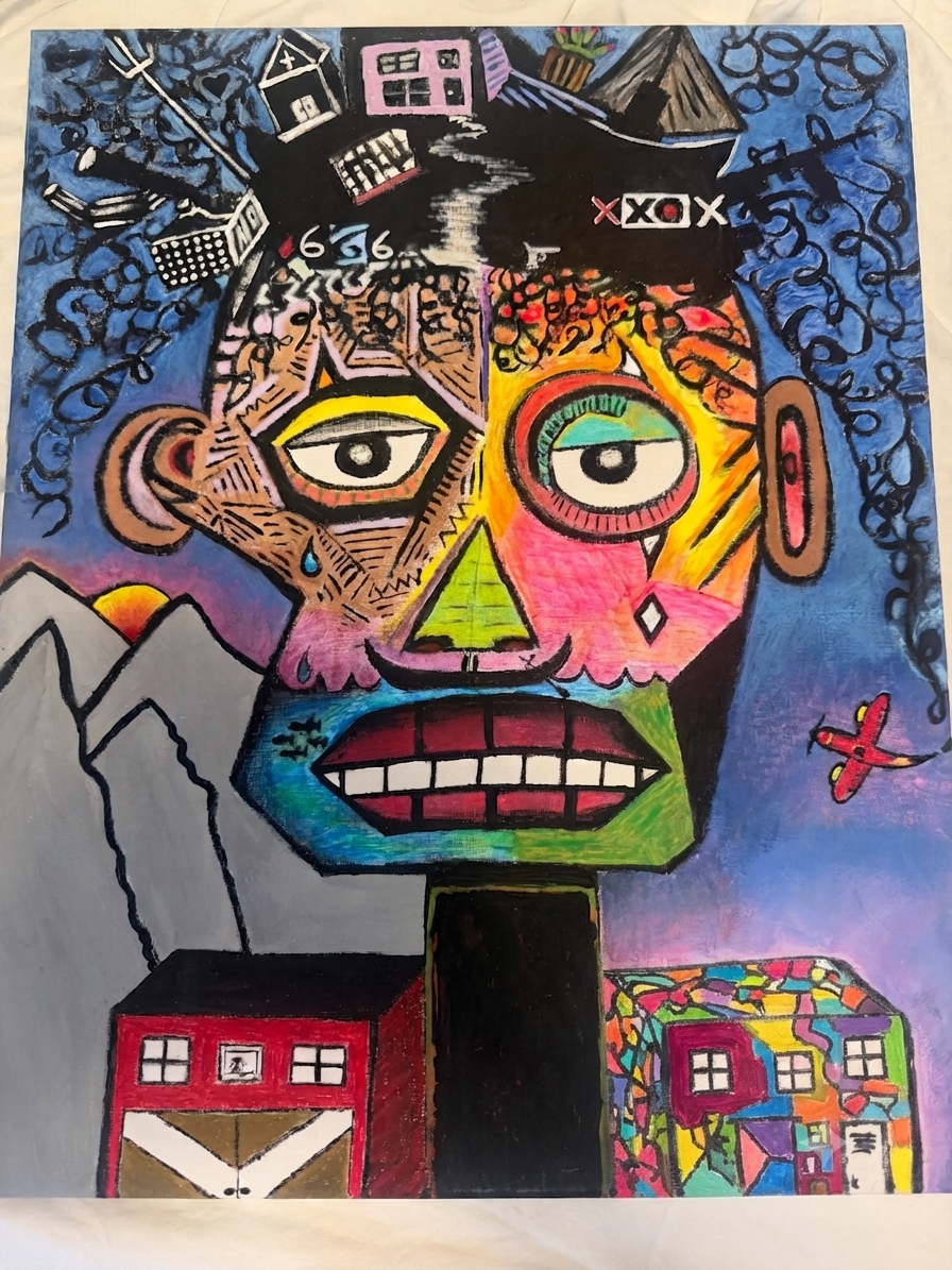 A colorful abstract painting of a human face with exaggerated features, including large eyes, a prominent nose, and an open mouth with visible teeth. The face is divided into sections with various patterns and colors. Surrounding the face are mountains, a sun, buildings, swirling shapes, and an airplane, all depicted in vibrant, contrasting colors.