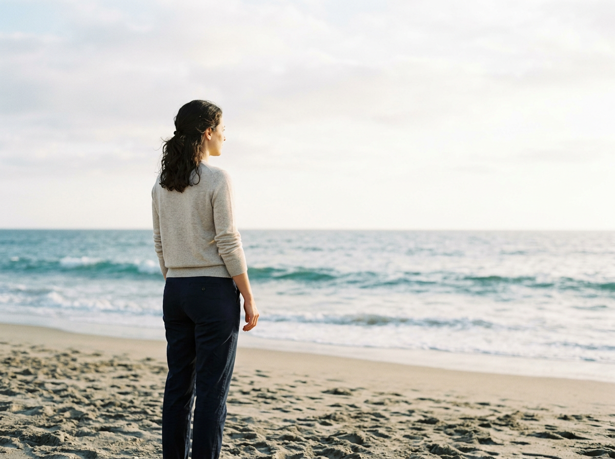 Woman taking in a view that supports her mental movie and visualisation process.