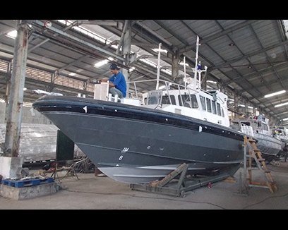11.5m patrol boat hull under construction.